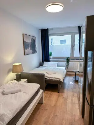 Ein Bett oder Betten in einem Zimmer der Unterkunft Apartment with kitchen, bed, sofa