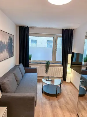Ein Sitzbereich in der Unterkunft Apartment with kitchen, bed, sofa