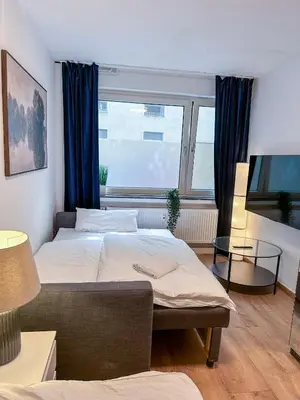 Ein Bett oder Betten in einem Zimmer der Unterkunft Apartment with kitchen, bed, sofa