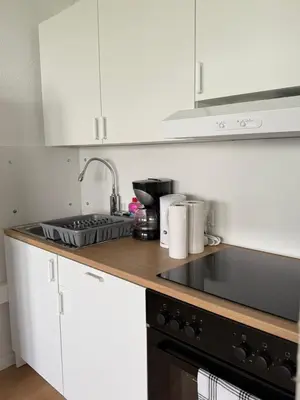 Küche/Küchenzeile in der Unterkunft Moderne Ferienwohnung Ratingen