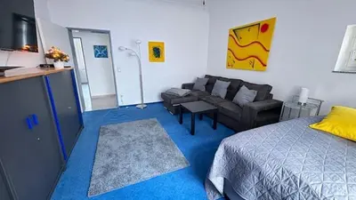 Ein Bett oder Betten in einem Zimmer der Unterkunft Charming Apartment in historischer Polizeiwache