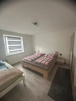 Ein Bett oder Betten in einem Zimmer der Unterkunft Moderne 2,5 Zimmer Wohnung in Herne im Herzen des Ruhrgebiets
