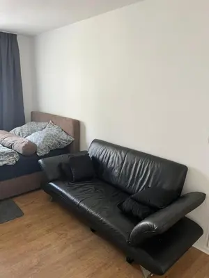 Ein Sitzbereich in der Unterkunft Barmen Stilvolle Wohnung