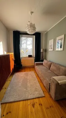 Ein Sitzbereich in der Unterkunft Ferienwohnung inmitten der Natur und Seen