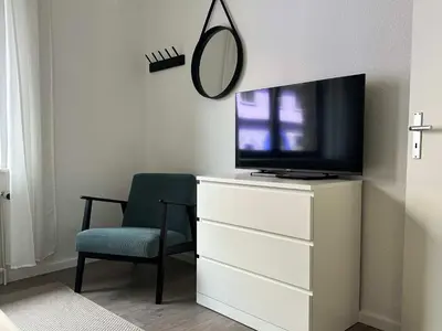 TV/Unterhaltungsangebot in der Unterkunft 6P Zentrale Suite mit Balkon & Parkplatz