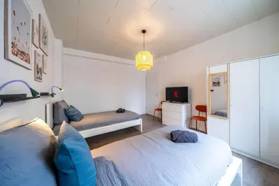 Ein Bett oder Betten in einem Zimmer der Unterkunft 6P Zentrale Suite mit Balkon & Parkplatz