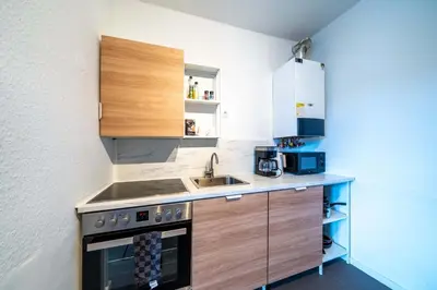 Küche/Küchenzeile in der Unterkunft 6P Zentrale Suite mit Balkon & Parkplatz