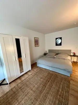 Ein Bett oder Betten in einem Zimmer der Unterkunft FairLoft - Messeloft - 5 Minutes to fair - 10 Minutes to city center