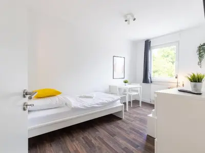 Ein Bett oder Betten in einem Zimmer der Unterkunft Nice Apartment Castrop-Rauxel