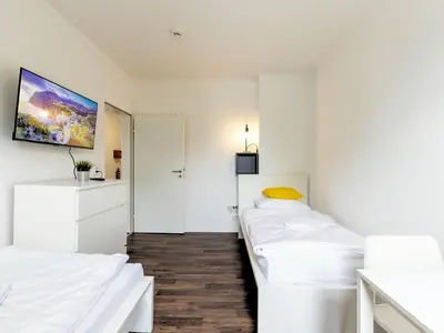 Ein Bett oder Betten in einem Zimmer der Unterkunft Nice Apartment Castrop-Rauxel