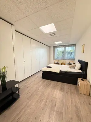 Ein Bett oder Betten in einem Zimmer der Unterkunft Ferienwohnung Remscheid UHF