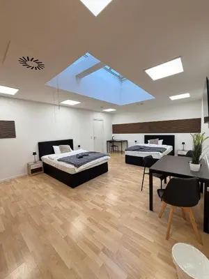 Ein Bett oder Betten in einem Zimmer der Unterkunft Ferienwohnung Remscheid UHF