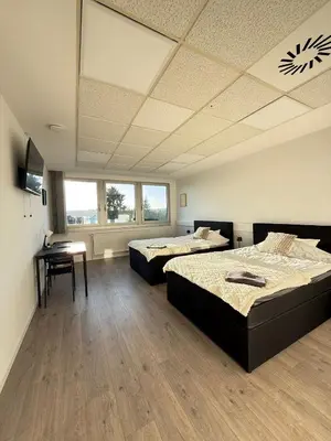 Ein Bett oder Betten in einem Zimmer der Unterkunft Ferienwohnung Remscheid UHF