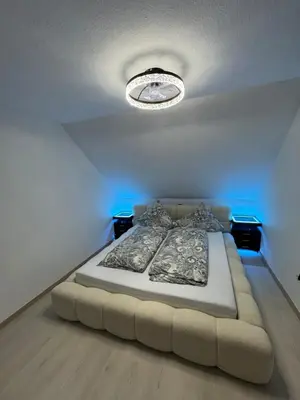 Ein Bett oder Betten in einem Zimmer der Unterkunft Ays-SPA, Whirlpool & Sauna