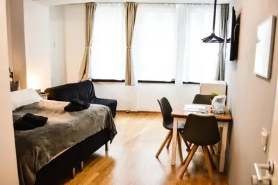 Ein Bett oder Betten in einem Zimmer der Unterkunft Centerapartments Tonhallenstraße
