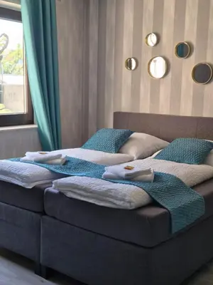 Ein Bett oder Betten in einem Zimmer der Unterkunft Studio Apartment