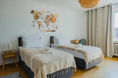 Ein Bett oder Betten in einem Zimmer der Unterkunft ATLAS Apartment Dinslaken, 3 Zimmer, Zentrum, Nähe Bahnhof, Balkon