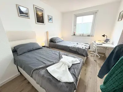Ein Bett oder Betten in einem Zimmer der Unterkunft Essen Stilvolles 2 Zimmer Apartment in City und Messenähe