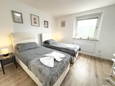 Ein Bett oder Betten in einem Zimmer der Unterkunft Essen Stilvolles 2 Zimmer Apartment in City und Messenähe