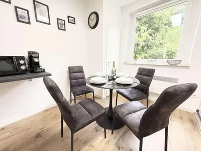 Ein Sitzbereich in der Unterkunft Essen Stilvolles 2 Zimmer Apartment in City und Messenähe