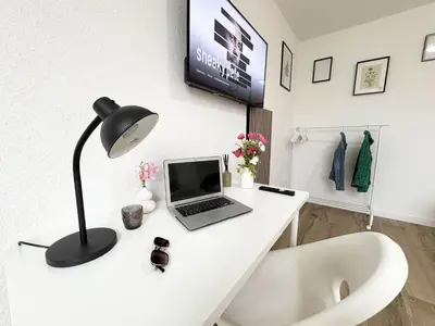 TV/Unterhaltungsangebot in der Unterkunft Essen Stilvolles 2 Zimmer Apartment in City und Messenähe