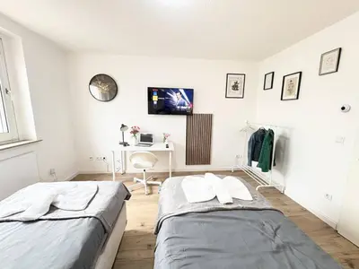 Ein Bett oder Betten in einem Zimmer der Unterkunft Essen Stilvolles 2 Zimmer Apartment in City und Messenähe