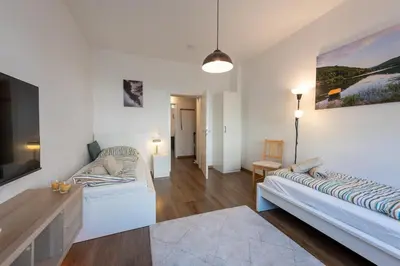 Ein Bett oder Betten in einem Zimmer der Unterkunft HagenStay Bülow 1
