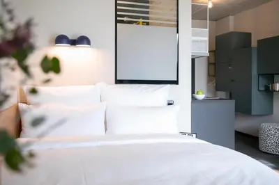 Ein Bett oder Betten in einem Zimmer der Unterkunft STAYERY Bochum Ehrenfeld