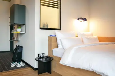 Ein Bett oder Betten in einem Zimmer der Unterkunft STAYERY Bochum Ehrenfeld
