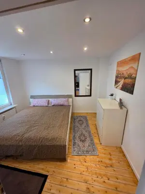 Ein Bett oder Betten in einem Zimmer der Unterkunft Stilvolles City Apartment Iserlohn, möbliert und all-inclusive