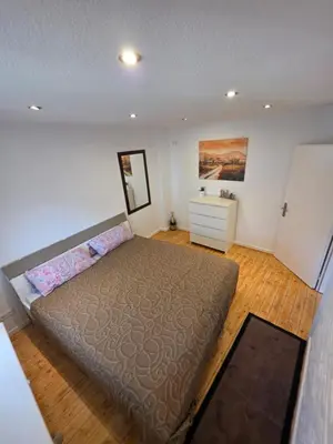 Ein Bett oder Betten in einem Zimmer der Unterkunft Stilvolles City Apartment Iserlohn, möbliert und all-inclusive