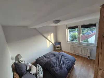 Ein Bett oder Betten in einem Zimmer der Unterkunft UhlenLoft ideal für Messe Düsseldorf Essen