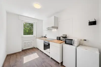 Küche/Küchenzeile in der Unterkunft Lüdenscheid Stay- Moderne Monteurzimmer