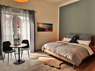 Ein Bett oder Betten in einem Zimmer der Unterkunft Neues Ruhrtal Apartment 2 mit Balkon