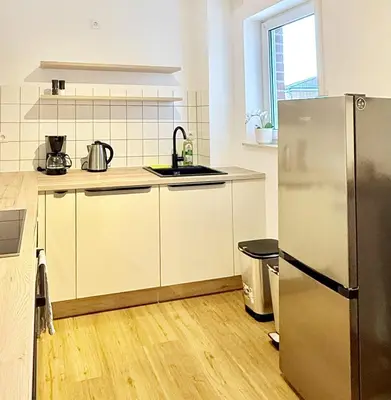 Küche/Küchenzeile in der Unterkunft Neu renoviertes Apartment mit 2 Schlafzimmern, Küche & Waschtrockner nahe Zentrum Borken