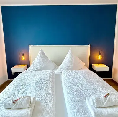 Ein Bett oder Betten in einem Zimmer der Unterkunft Neu renoviertes Apartment mit 2 Schlafzimmern, Küche & Waschtrockner nahe Zentrum Borken