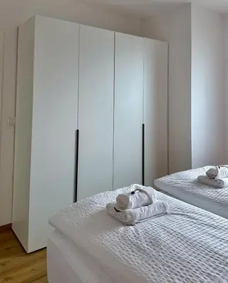 Ein Bett oder Betten in einem Zimmer der Unterkunft Neu renoviertes Apartment mit 2 Schlafzimmern, Küche & Waschtrockner nahe Zentrum Borken