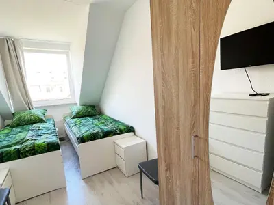 Ein Bett oder Betten in einem Zimmer der Unterkunft Modern Central Apartment in Duisburg