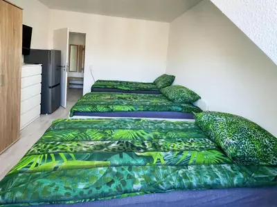Ein Bett oder Betten in einem Zimmer der Unterkunft Modern Central Apartment in Duisburg