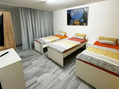 Ein Bett oder Betten in einem Zimmer der Unterkunft City View Apartment in Duisburg