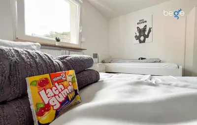 Ein Bett oder Betten in einem Zimmer der Unterkunft BEGE APARTMENTS PrimeWork