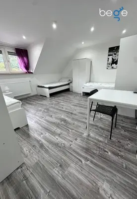 Ein Bett oder Betten in einem Zimmer der Unterkunft BEGE APARTMENTS PrimeWork