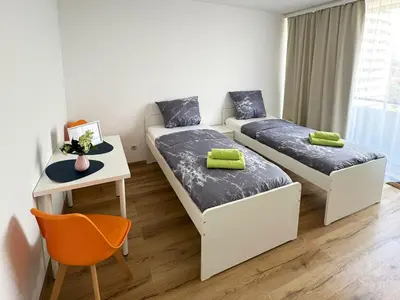 Ein Bett oder Betten in einem Zimmer der Unterkunft Bright Modern Apartments in Mülheim an der Ruhr