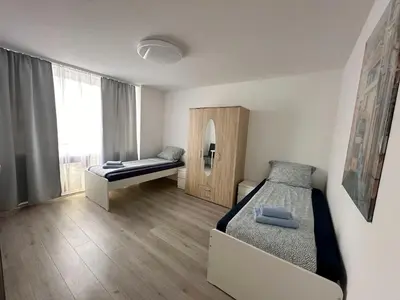 Ein Bett oder Betten in einem Zimmer der Unterkunft Bright Modern Apartments in Mülheim an der Ruhr