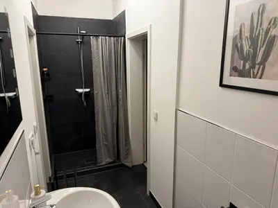 Ein Badezimmer in der Unterkunft Loft I 3 Min bis Hbf I Netflix I Boxspring Betten