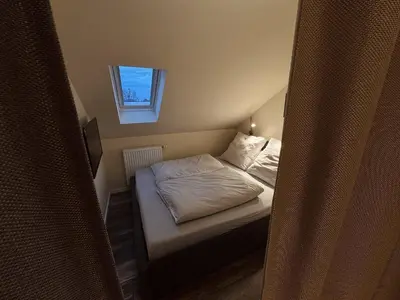 Ein Bett oder Betten in einem Zimmer der Unterkunft Ferienwohnung Chris