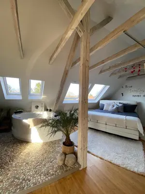 Ein Bett oder Betten in einem Zimmer der Unterkunft Wellness Suiten mit Whirlpool am Stadtrand von Essen