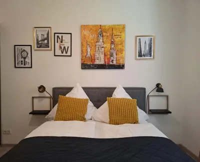 Ein Bett oder Betten in einem Zimmer der Unterkunft Urban-Chic-Zentral-Bahnhof-Altstadt-W2