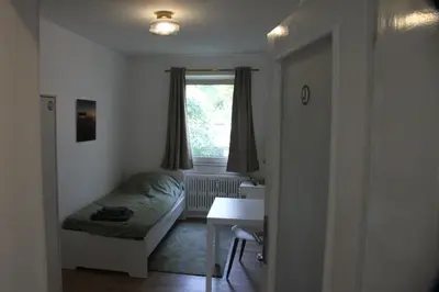 Ein Bett oder Betten in einem Zimmer der Unterkunft Work Inn Rhein Ruhr Appartement