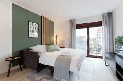 Ein Bett oder Betten in einem Zimmer der Unterkunft Moderne Ferienwohnungen in ruhiger Lage